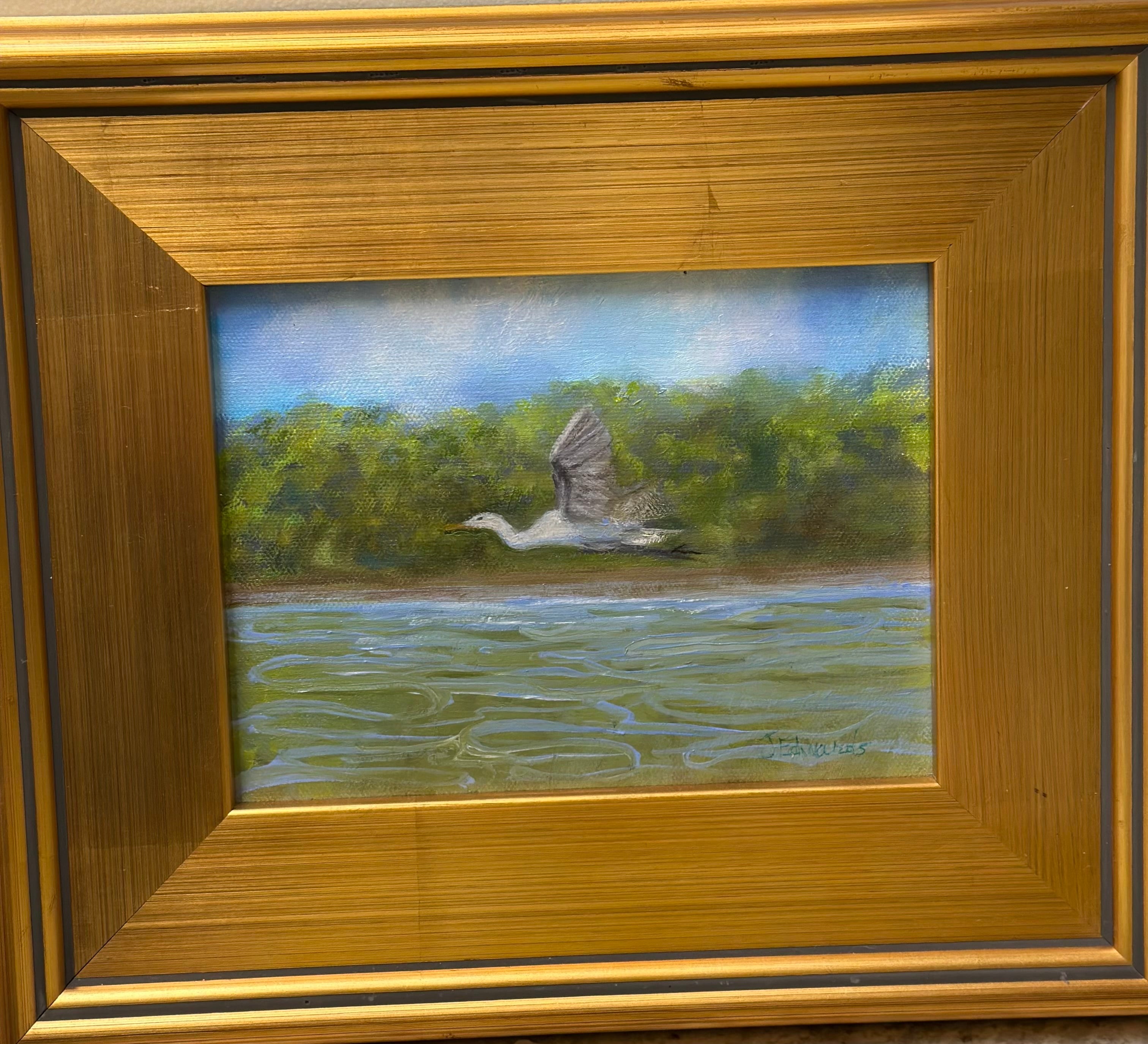 Blue Heron over water by Jenifer Edwards