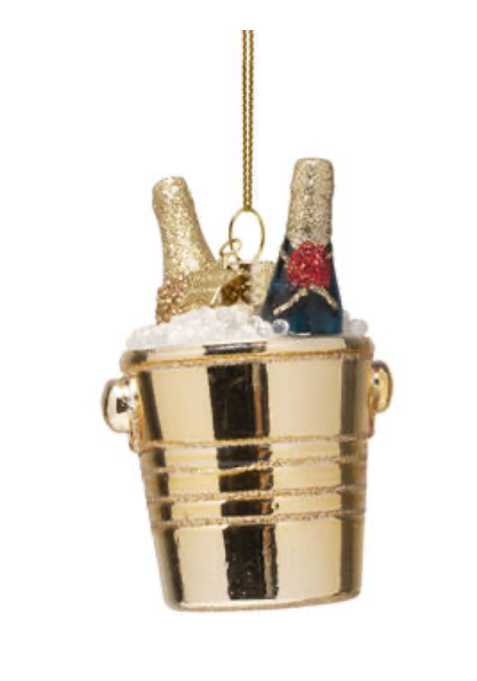 Ornament glass bottles of champagne in gold cooler